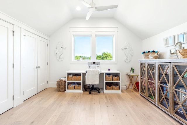 home office featuring vaulted ceiling, light wood-type flooring, and ceiling fan