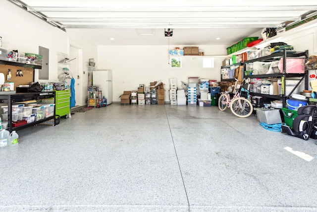 garage featuring white refrigerator