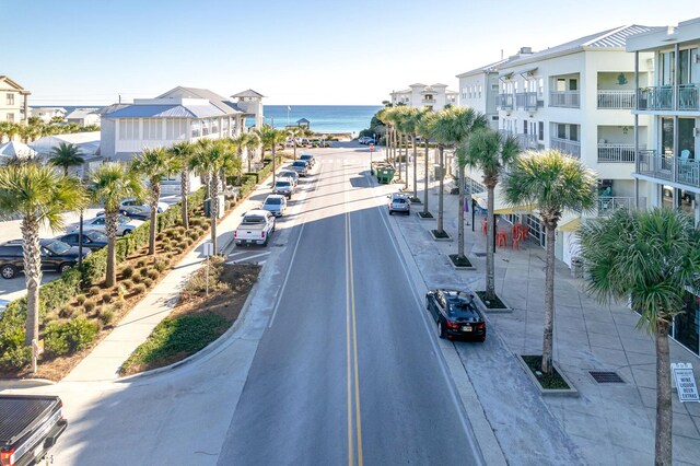 view of street featuring a water view