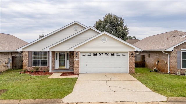 ranch-style home featuring a front lawn and a garage