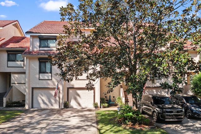 view of front of property with a garage