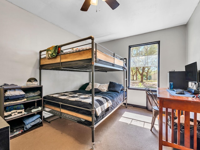 bedroom with ceiling fan and carpet