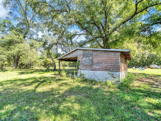 exterior space with a yard