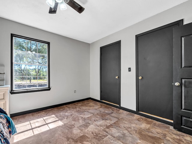 unfurnished bedroom with ceiling fan