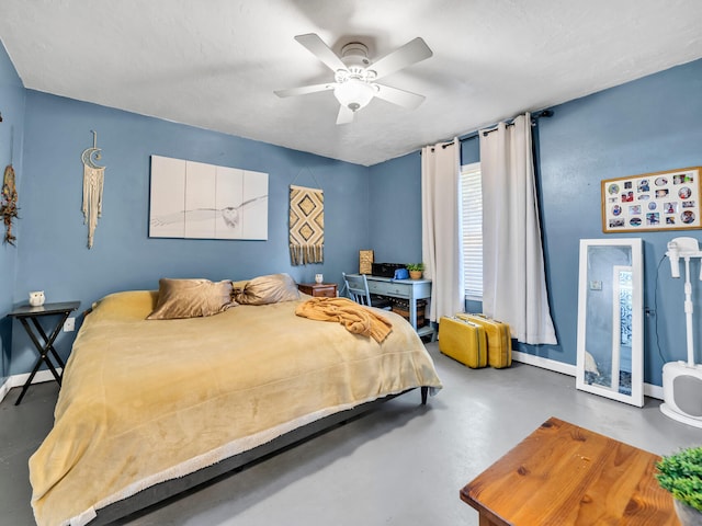 bedroom with concrete flooring, a textured ceiling, and ceiling fan