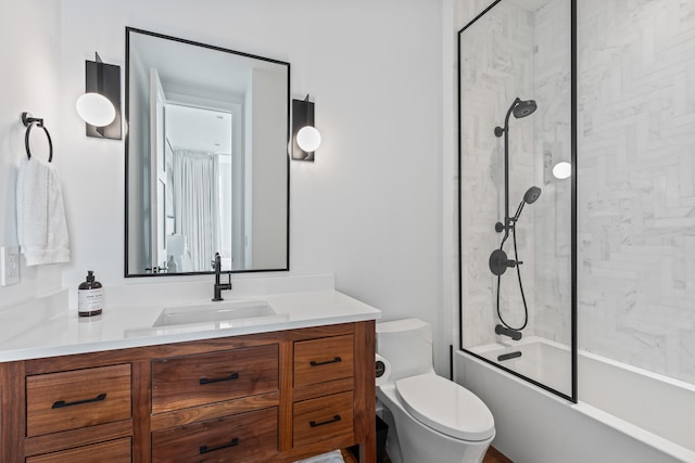 full bathroom with shower / bath combination with glass door, vanity, and toilet