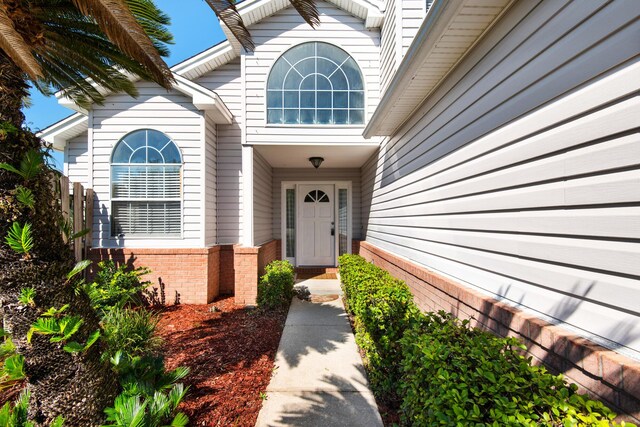 880 Brande Ct, Shalimar, FL 32579 - view of exterior entry with brick siding