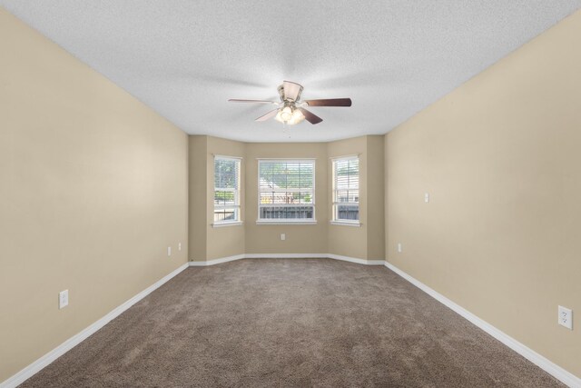 880 Brande Ct, Shalimar, FL 32579 - carpeted empty room featuring a ceiling fan, a textured ceiling, and baseboards