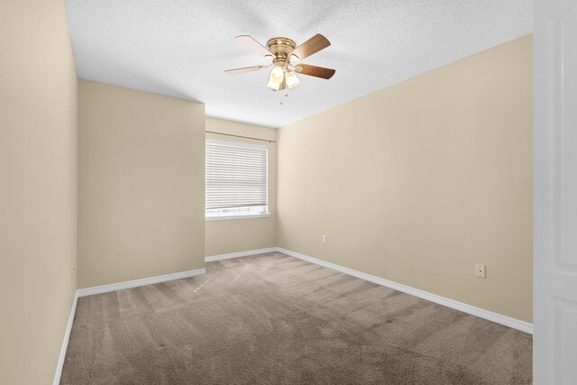 880 Brande Ct, Shalimar, FL 32579 - empty room featuring carpet flooring, a ceiling fan, a textured ceiling, and baseboards