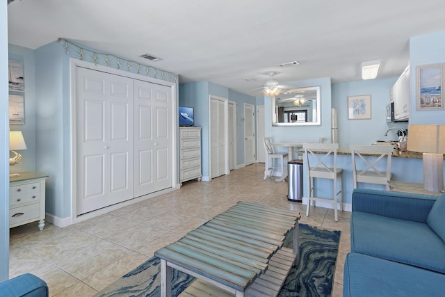 775 Gulf Shore Dr Unit 8112, Destin, FL 32541 - living area featuring a ceiling fan and light tile patterned floors