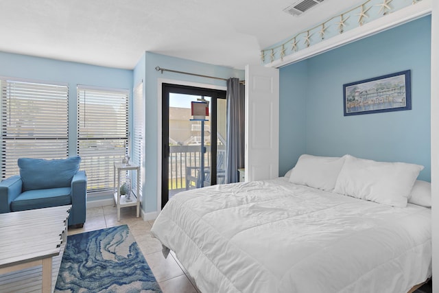 775 Gulf Shore Dr Unit 8112, Destin, FL 32541 - bedroom with access to exterior and tile patterned flooring