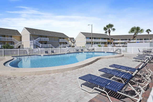 775 Gulf Shore Dr Unit 8112, Destin, FL 32541 - community pool featuring a patio area and a residential view