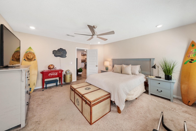 bedroom with ceiling fan and light colored carpet