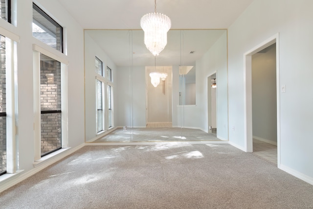 empty room featuring light colored carpet