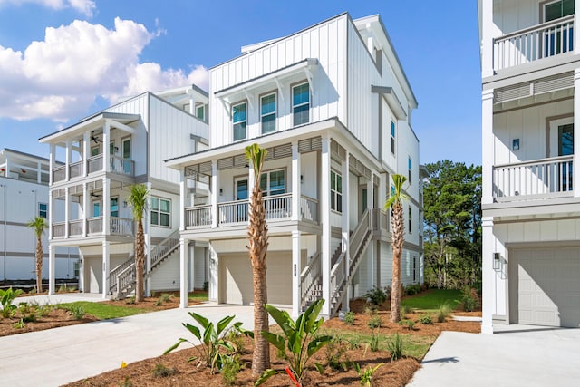 view of property with a balcony and a garage