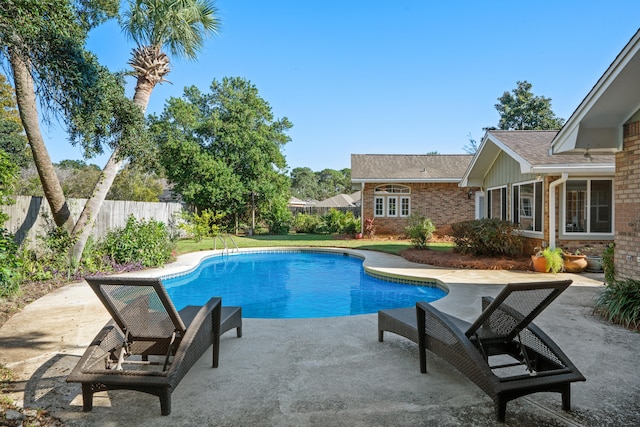 view of pool featuring a patio