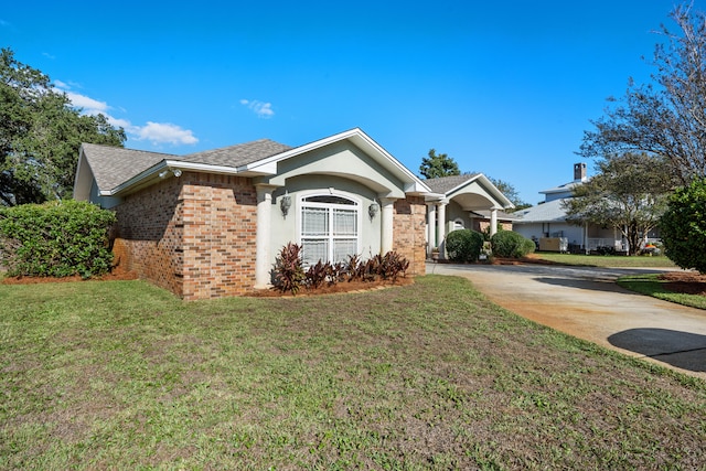 view of front of house with a front lawn