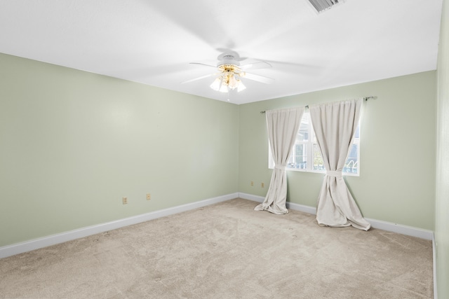 carpeted empty room with ceiling fan