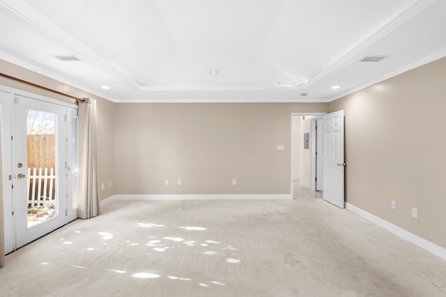 spare room with light carpet and ornamental molding