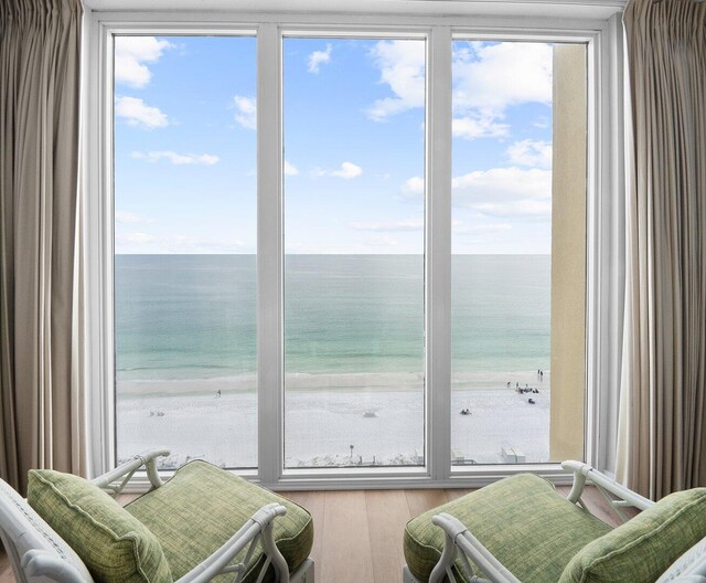 8477 Gulf Blvd Unit 1001, Navarre, FL 32566 - bedroom featuring a water view and wood finished floors