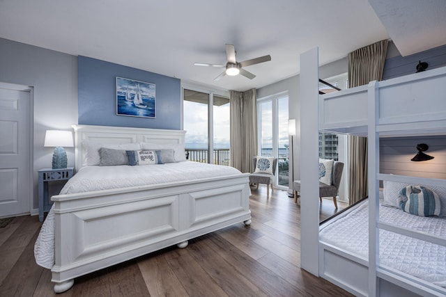 8477 Gulf Blvd Unit 1001, Navarre, FL 32566 - bedroom featuring access to outside, ceiling fan, and dark wood-style floors