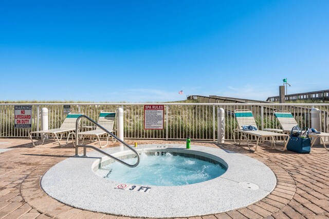 8477 Gulf Blvd Unit 1001, Navarre, FL 32566 - view of swimming pool with a community hot tub