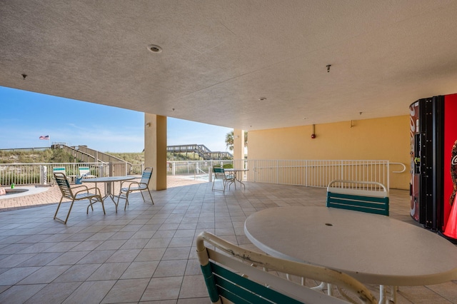 8477 Gulf Blvd Unit 1001, Navarre, FL 32566 - view of patio with outdoor dining space
