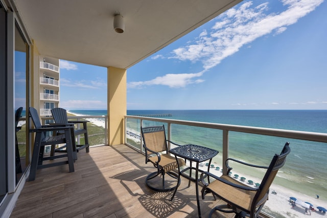 8477 Gulf Blvd Unit 1001, Navarre, FL 32566 - balcony featuring a view of the beach and a water view