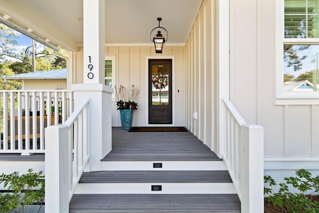 doorway to property with covered porch