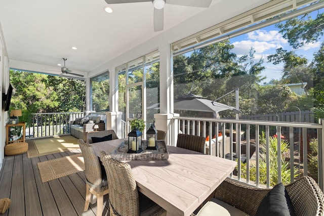 sunroom / solarium with ceiling fan