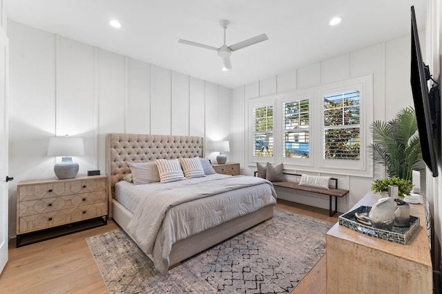 bedroom featuring light hardwood / wood-style floors and ceiling fan