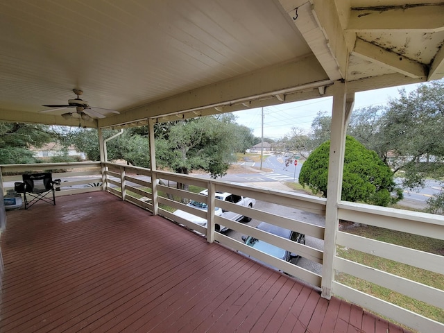 wooden deck with ceiling fan