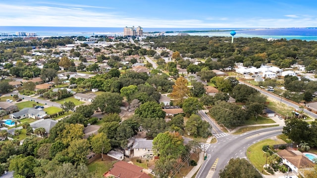 drone / aerial view featuring a water view and a residential view