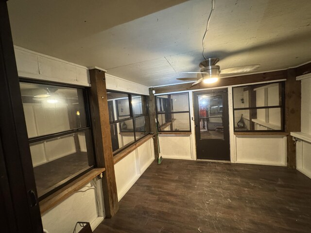 hall with dark wood-type flooring