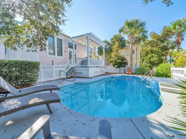 view of swimming pool featuring a pergola and a patio area