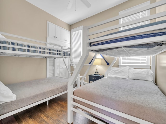 bedroom featuring dark wood-type flooring and ceiling fan