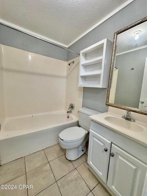 260 Seneca Ave, Panama City, FL 32404 - bathroom with a textured ceiling, washtub / shower combination, toilet, tile patterned floors, and vanity