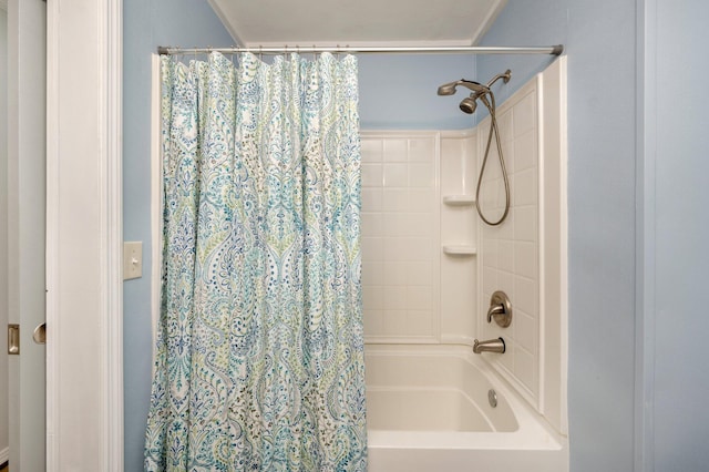 bathroom with shower / bathtub combination with curtain