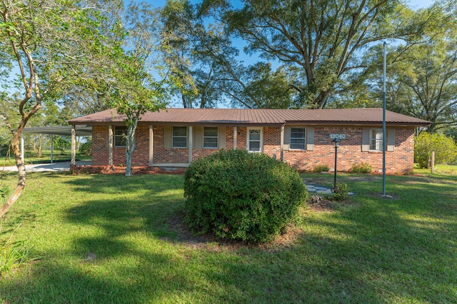 ranch-style home with a front lawn