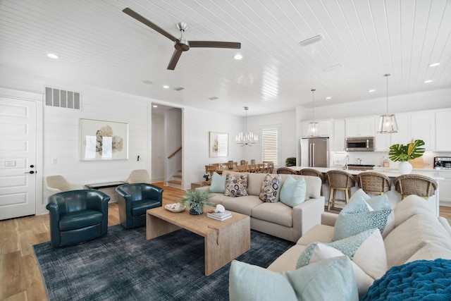 living room with visible vents, wooden ceiling, stairway, wood finished floors, and recessed lighting