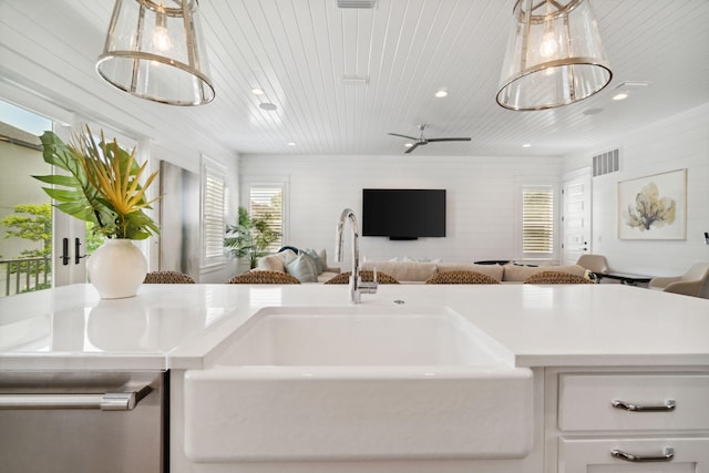 kitchen featuring wooden ceiling, white cabinets, and ceiling fan