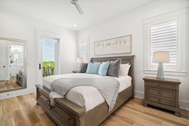 bedroom featuring access to exterior, connected bathroom, light hardwood / wood-style flooring, and ceiling fan