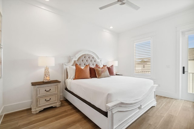 bedroom featuring ceiling fan and light hardwood / wood-style floors