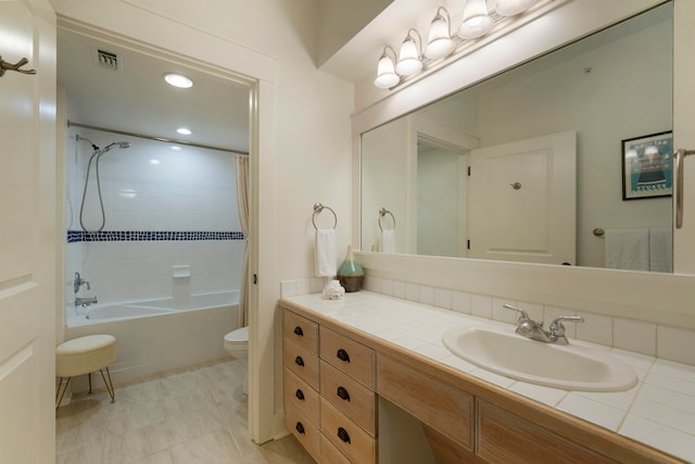 full bathroom with tile patterned floors, shower / tub combo, toilet, and vanity