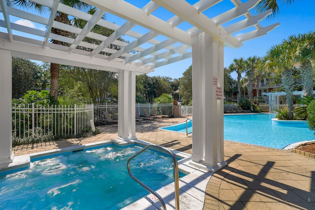 view of swimming pool with a pergola and a patio area