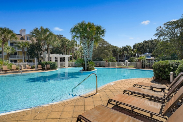 view of swimming pool featuring a patio area