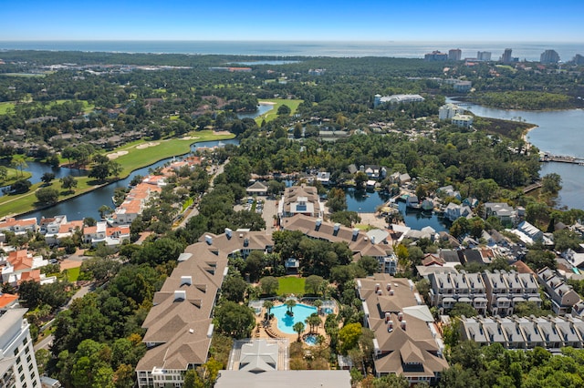 drone / aerial view with a water view