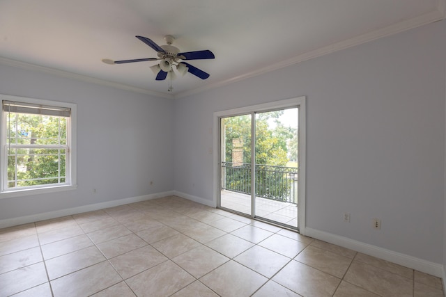 unfurnished room with ceiling fan, light tile patterned floors, and crown molding