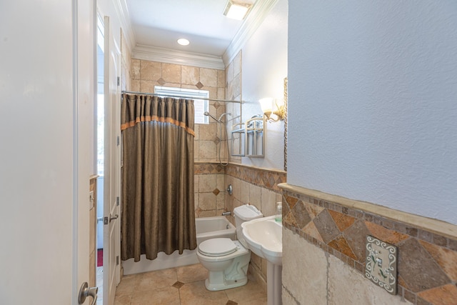 bathroom with shower / bath combination with curtain, tile patterned floors, crown molding, tile walls, and toilet