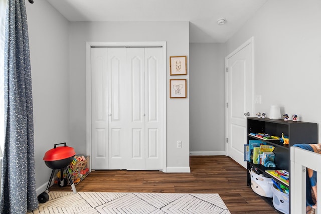 game room with hardwood / wood-style flooring